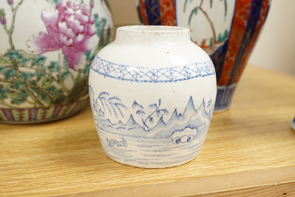 An Imari vase and cover-28cm high, a Chinese jar and prunus vase and a small blue and white jar.